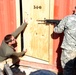 Navy Explosive Ordnance Disposal teach House-Borne Improvised Explosive Device training to Soldiers