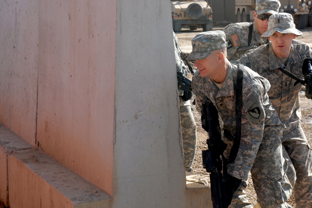 Navy Explosive Ordnance Disposal teach House-Borne Improvised Explosive Device training to Soldiers