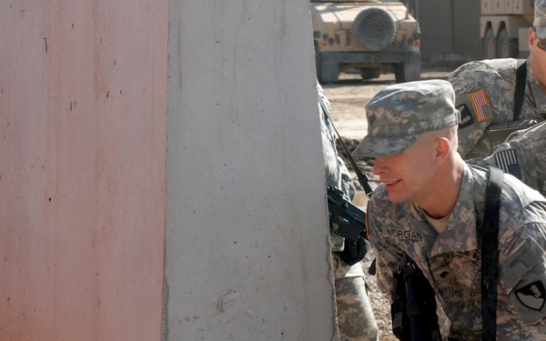 Navy Explosive Ordnance Disposal teach House-Borne Improvised Explosive Device training to Soldiers