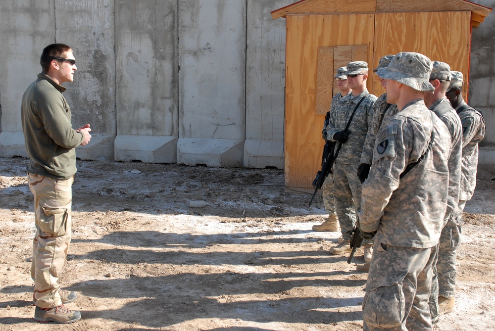 Navy Explosive Ordnance Disposal teach House-Borne Improvised Explosive Device training to Soldiers