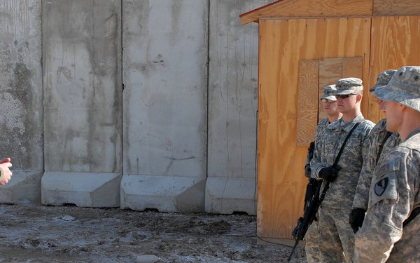 Navy Explosive Ordnance Disposal teach House-Borne Improvised Explosive Device training to Soldiers