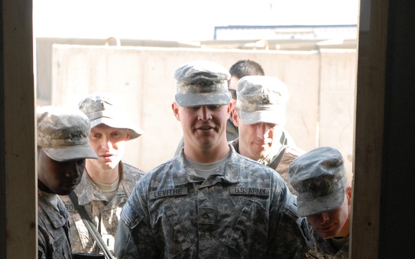 Navy Explosive Ordnance Disposal teach House-Borne Improvised Explosive Device training to Soldiers