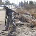 Neighborhood presence patrol, weapons cache search in Baghdad