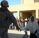 Iraqi children receive school supplies