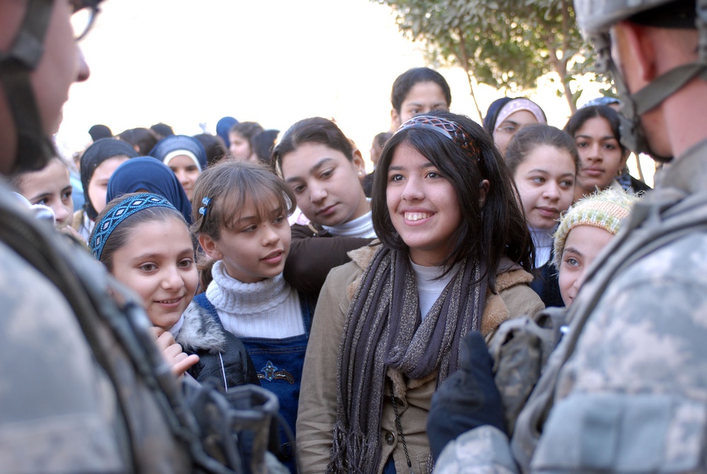 Arch Angels, Iraqi army team up for humanitarian aid drop