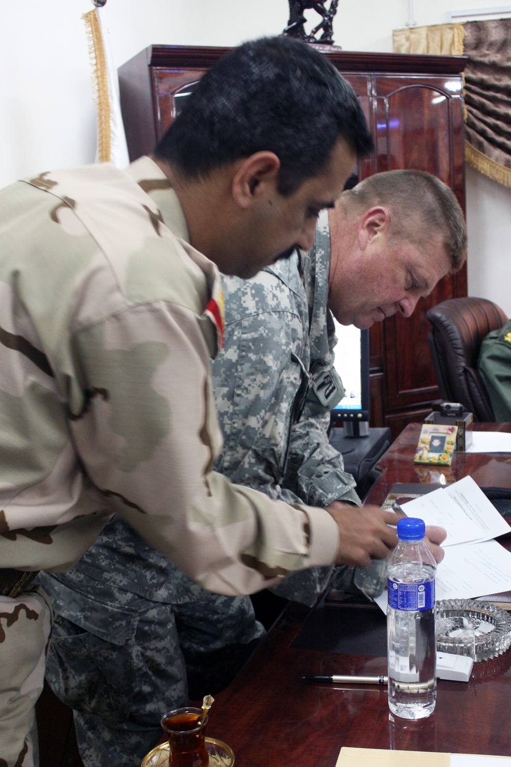 U.S. military signs over Camp Ramadi, Iraq