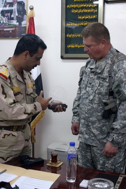 U.S. military signs over Camp Ramadi, Iraq