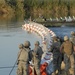 Naval Mobile Construction Battalion 27 constructs river barrier in Western Iraq