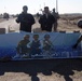 Headhunters, Iraqi army distribute information billboards