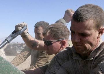 Marines construct and guard combat outposts