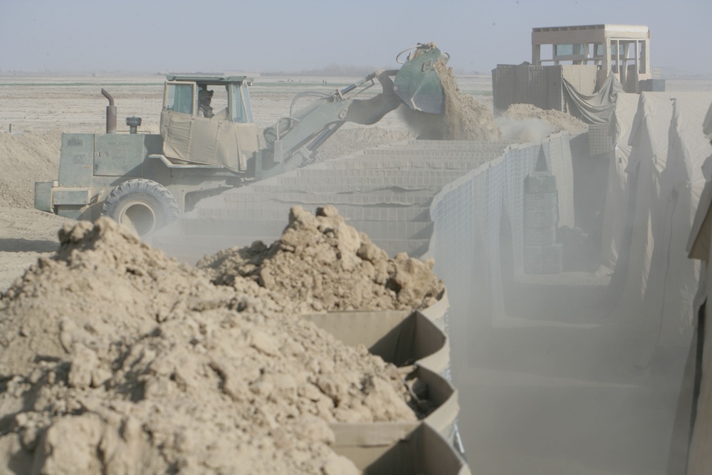 Marines construct and guard combat outposts