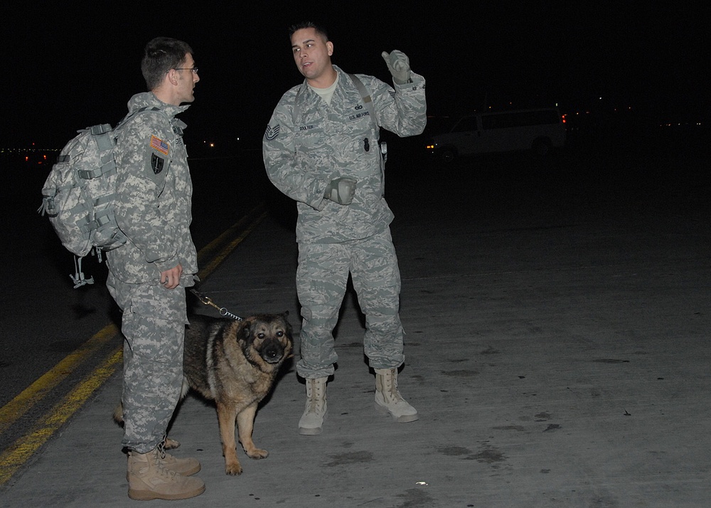 Air Force Airmen Assisting Army Soldiers