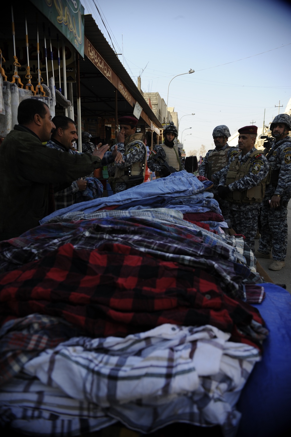 Patrol in the Al Rissala market in Mosul