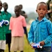 Children of Uganda Peoples Defense Force Soldiers Stand Watching a Graduation Ceremony at the UPDF Non-Commissioned Officers Academy in Jinja.