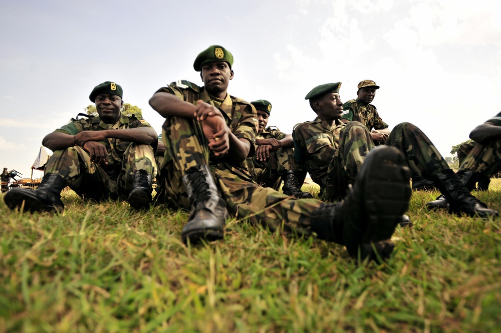 Uganda Peoples Defense Force Soldiers Sit in a Field Waiting to Attend a Graduation Ceremony in Jinja.