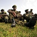 Uganda Peoples Defense Force Soldiers Sit in a Field Waiting to Attend a Graduation Ceremony in Jinja.