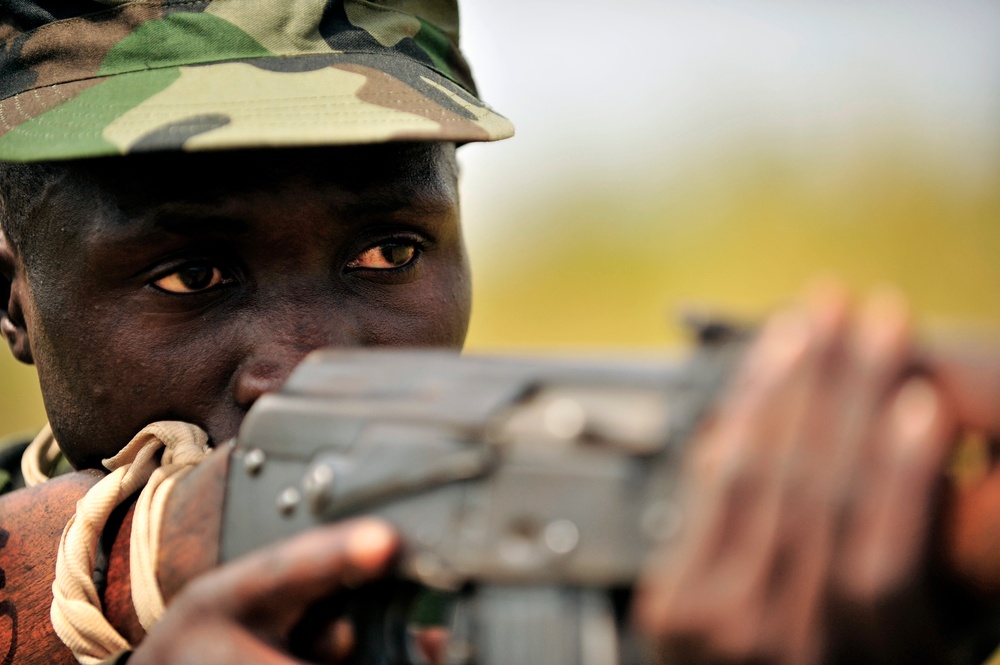 A Uganda Peoples Defense Force Soldier Demonstrates Skills Learned During the UPDF Non-Commissioned Officers Academy in Jinja.