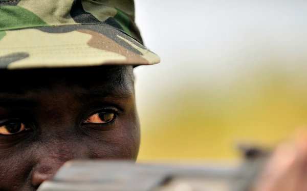 A Uganda Peoples Defense Force Soldier Demonstrates Skills Learned During the UPDF Non-Commissioned Officers Academy in Jinja.