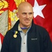 Civilian journalist receives Navy's second highest honor