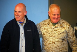 Civilian journalist receives Navy's second highest honor