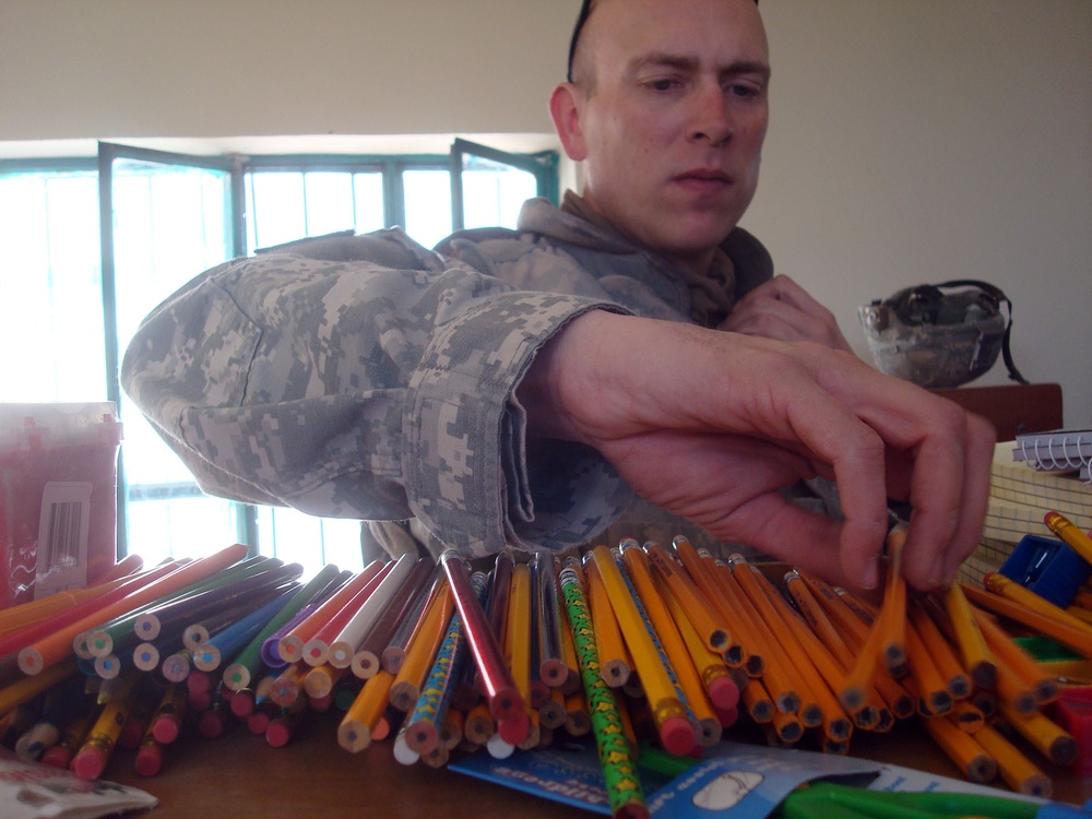 Strykehorse Soldiers, Iraqi Police bring supplies, joy to students