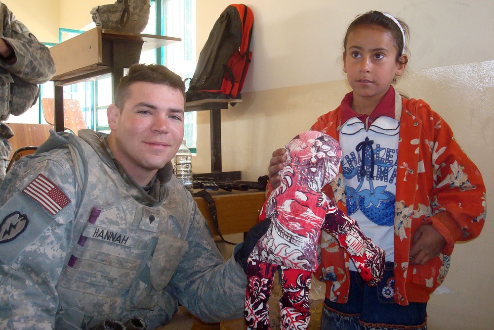 Strykehorse Soldiers, Iraqi Police bring supplies, joy to students