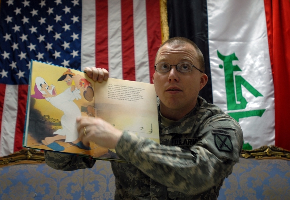 Soldiers connect with children through reading