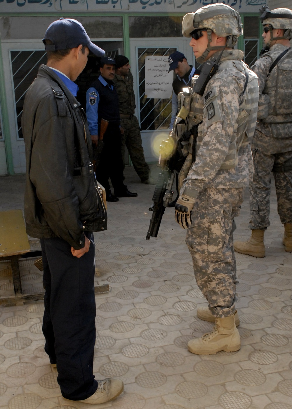 Iraqi police, military police conduct polling station over watch