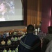 Service members Stand; Hudson Sings