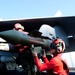 Ordnance unload aboard USS Theodore Roosevelt