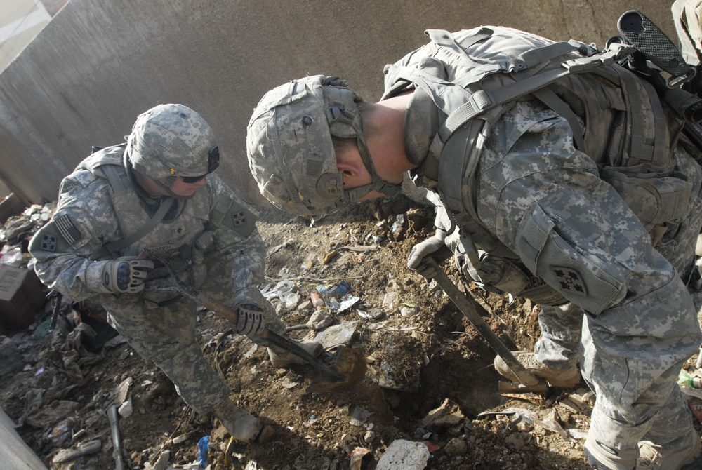 Comanche Troop Soldiers patrol Saha apartments
