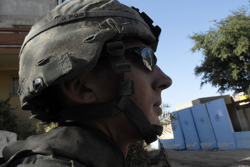 Comanche Troop Soldiers patrol Saha apartments