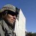 Comanche Troop Soldiers patrol Saha apartments