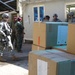 Iraqi security forces, Multi-National Division - Baghdad Soldiers deliver aid to new mothers