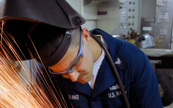 Metal welding aboard USS John C. Stennis