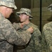 Paratroopers pin on combat badges in Iraq