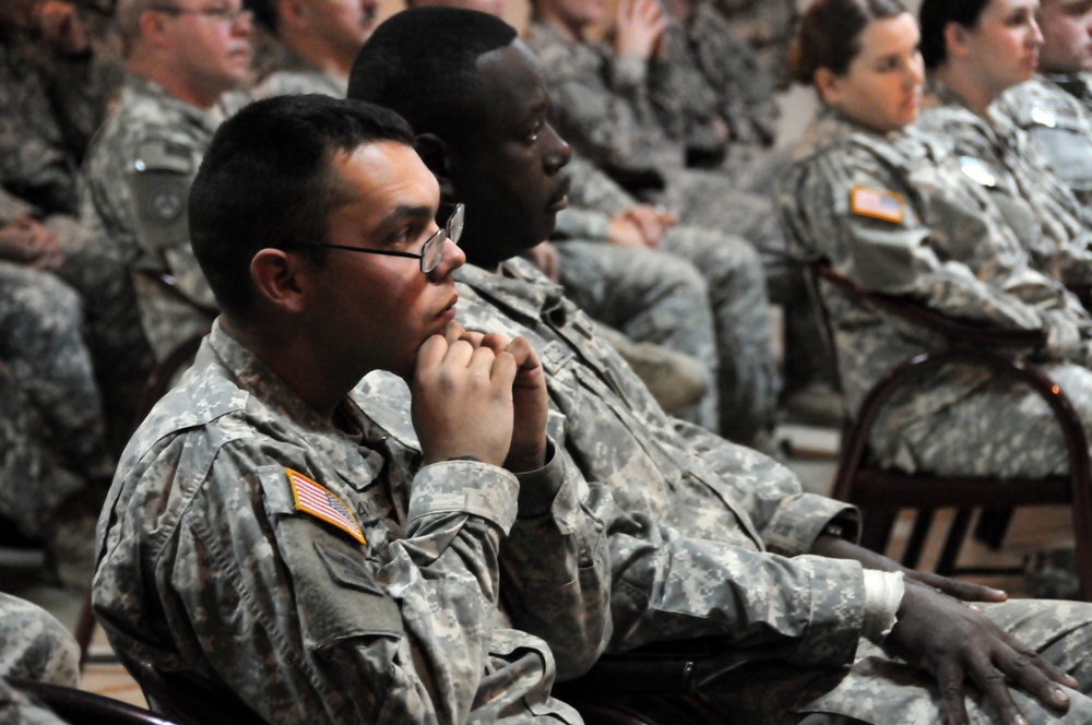 National Guardsmen listen to commanding officer