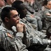 National Guardsmen listen to commanding officer