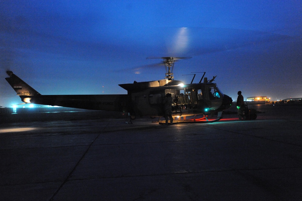Airmen help Iraqi aircrew perform night missions using night vision goggles