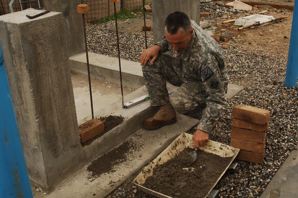 Army Corps of Engineers builds school through teaching contractors