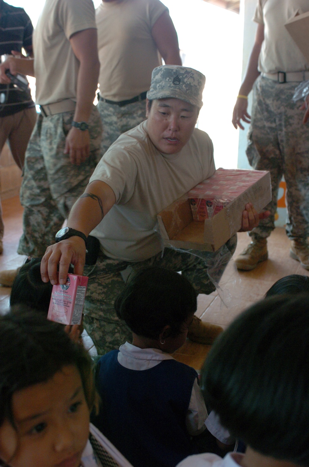 Hawaii Soldiers, Thai Marines distribute 37,000 cartons of milk to schools, community