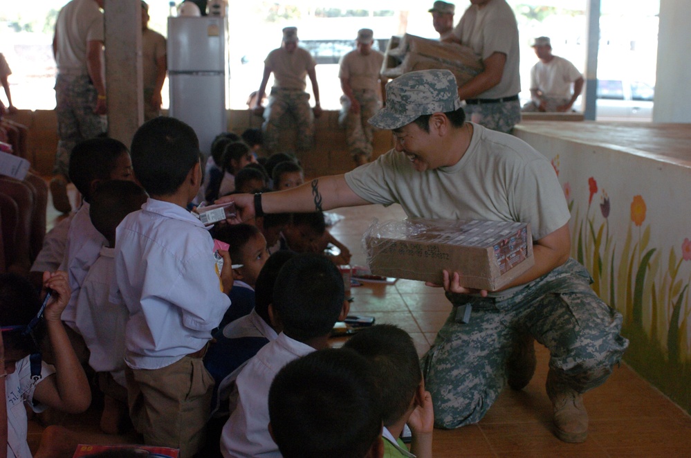 Hawaii Soldiers, Thai Marines distribute 37,000 cartons of milk to schools, community