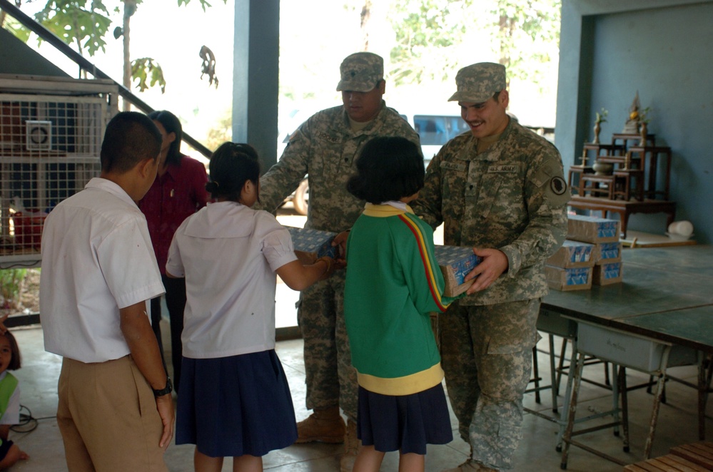 Hawaii Soldiers, Thai Marines distribute 37,000 cartons of milk to schools, community