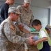 Hawaii Soldiers, Thai Marines distribute 37,000 cartons of milk to schools, community