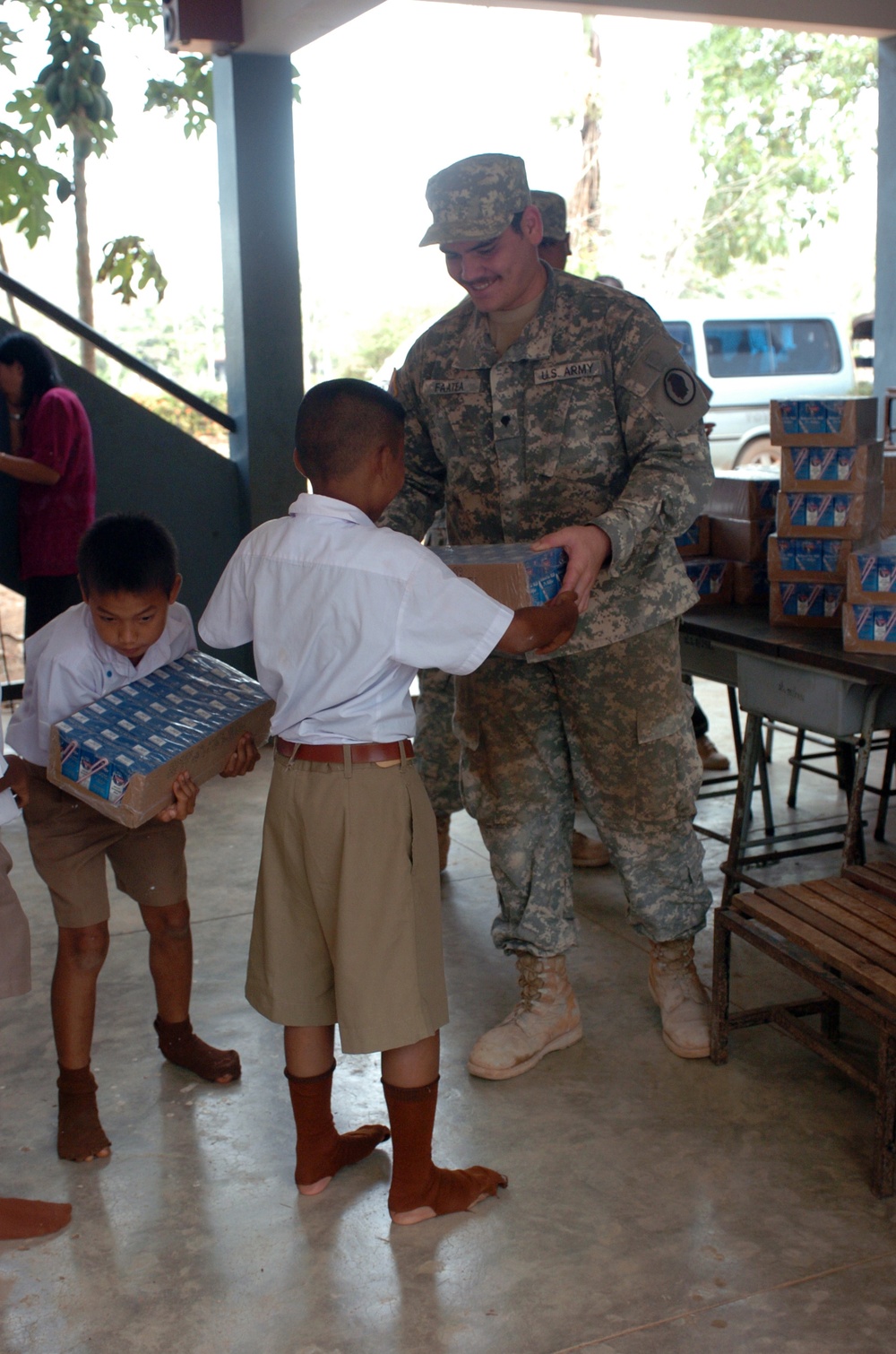 Hawaii Soldiers, Thai Marines distribute 37,000 cartons of milk to schools, community