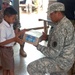 Hawaii Soldiers, Thai Marines distribute 37,000 cartons of milk to schools, community