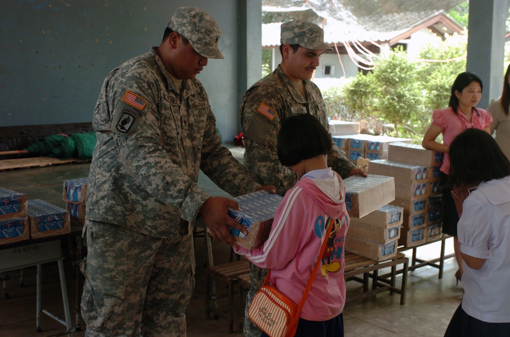 Hawaii Soldiers, Thai Marines distribute 37,000 cartons of milk to schools, community