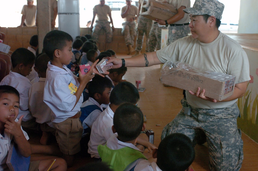 Hawaii Soldiers, Thai Marines distribute 37,000 cartons of milk to schools, community
