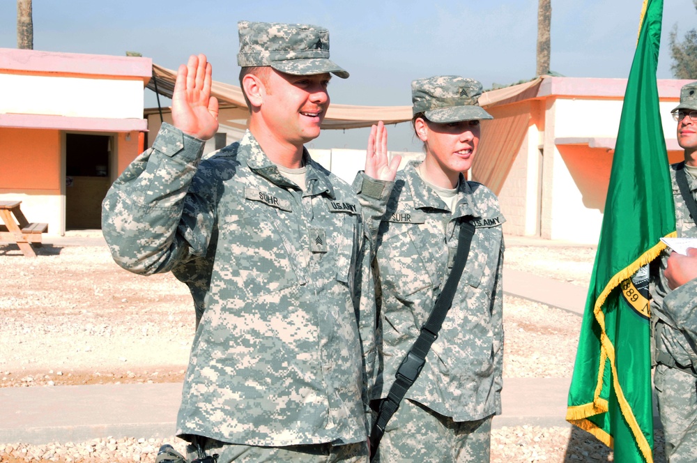 Army couple takes reenlistment oath in Iraq