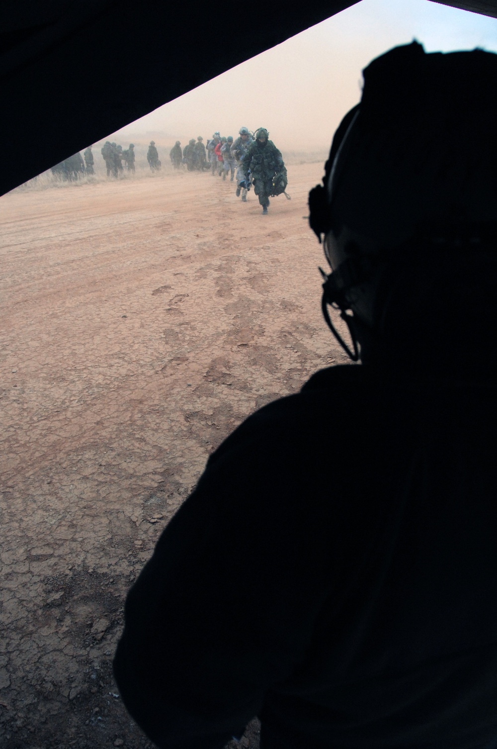 Canadians Dismount Helicopter at Fort Pickett